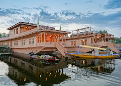 WelcomHeritage Gurkha Houseboats Logo